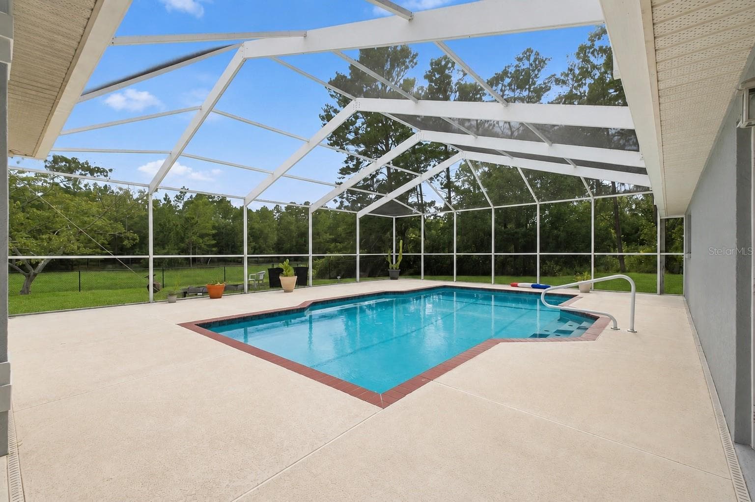 Screen enclosed pool - 11200 WOODLAND WATERS BLVD, WEEKI WACHEE