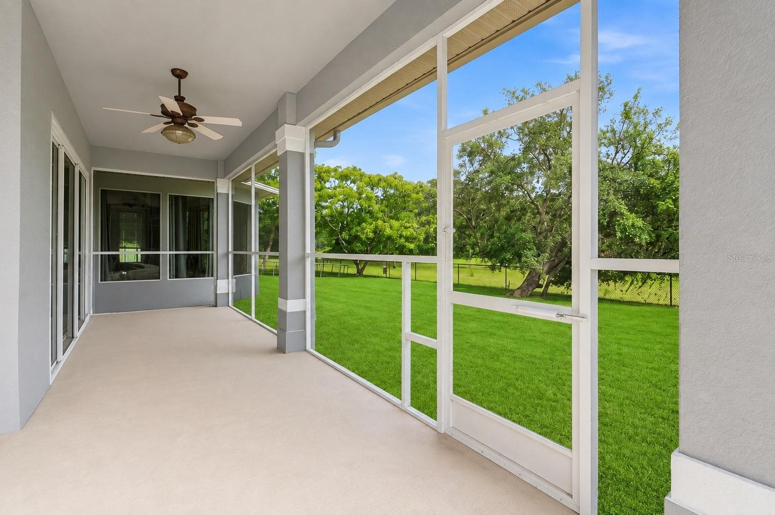 Screen enclosed lanai - 11200 WOODLAND WATERS BLVD, WEEKI WACHEE