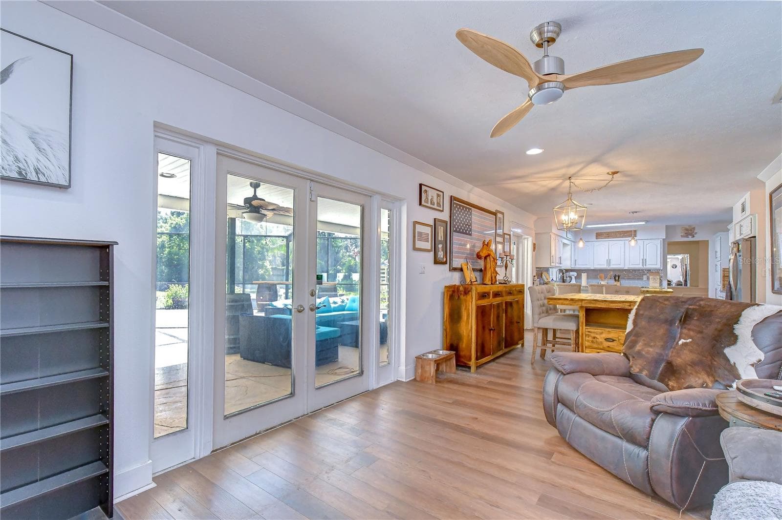 Luxury vinyl plank flooring flows throughout the first floor - 901 WOODVIEW DR, BRANDON