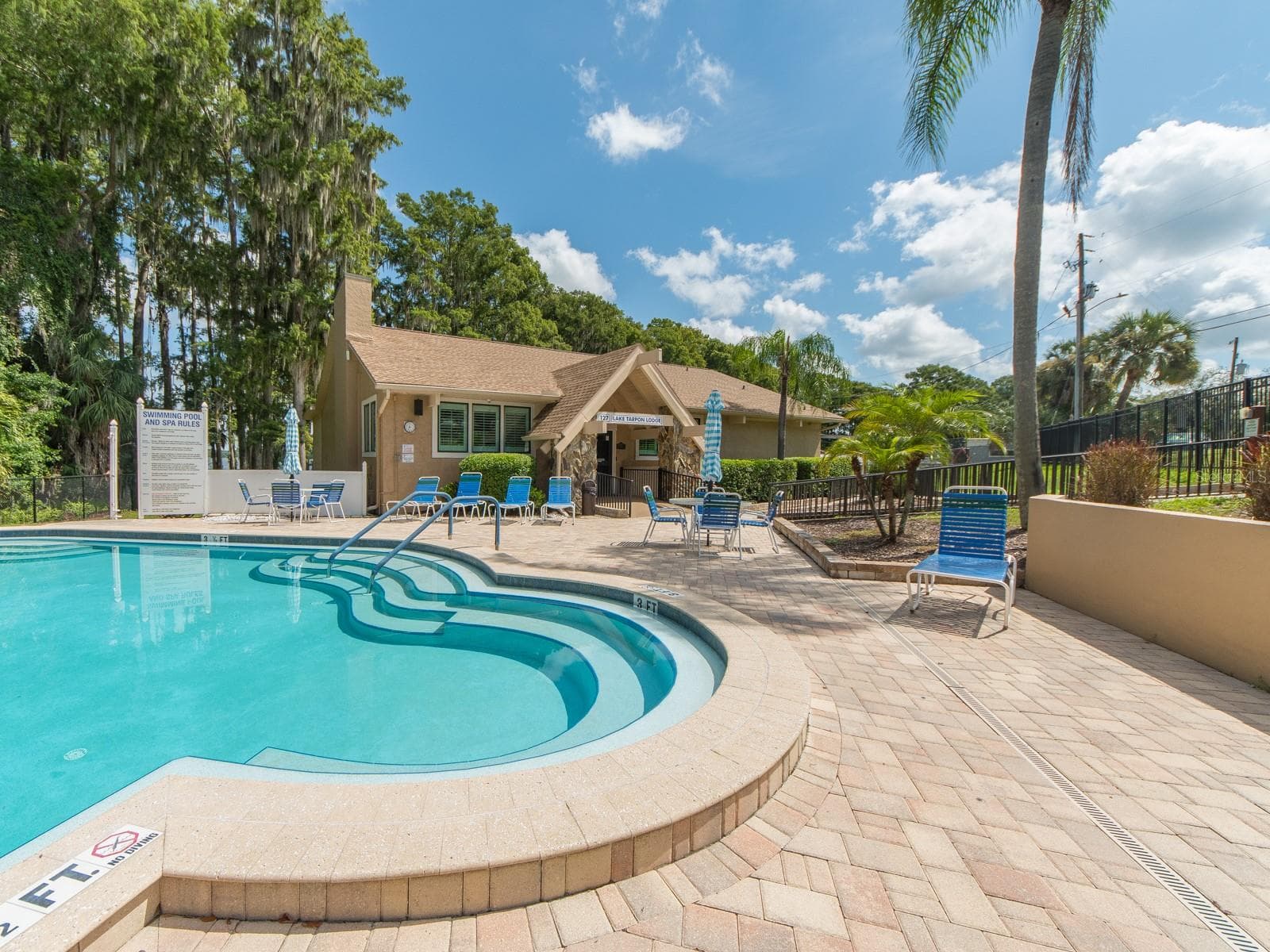 The Lakeside Lodge offers residents an additional community pool and gathering space, adding even more opportunities to relax and enjoy Highland Lakes lifestyle. - 1207 TIMBERBROOKE DR, PALM HARBOR