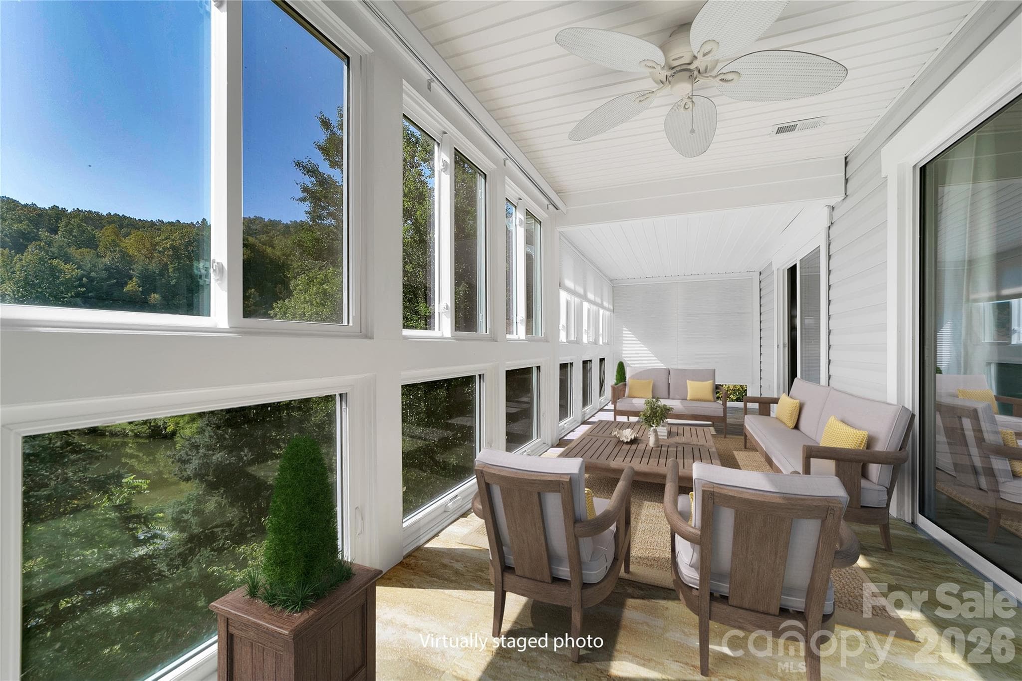 Virtually staged sunroom. - 110 Lakeview Court, Brevard