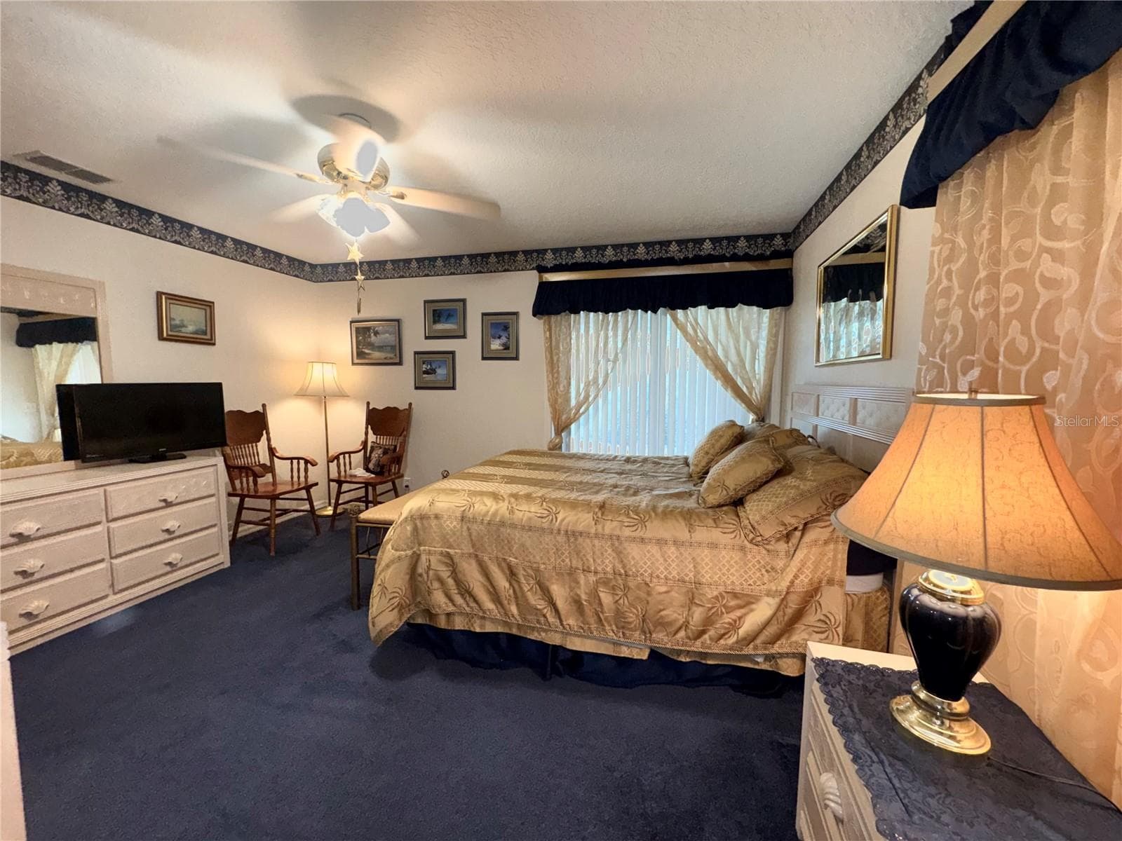 1st floor bedroom with en suite an walk in closet - 17725 POWERLINE RD, DADE CITY