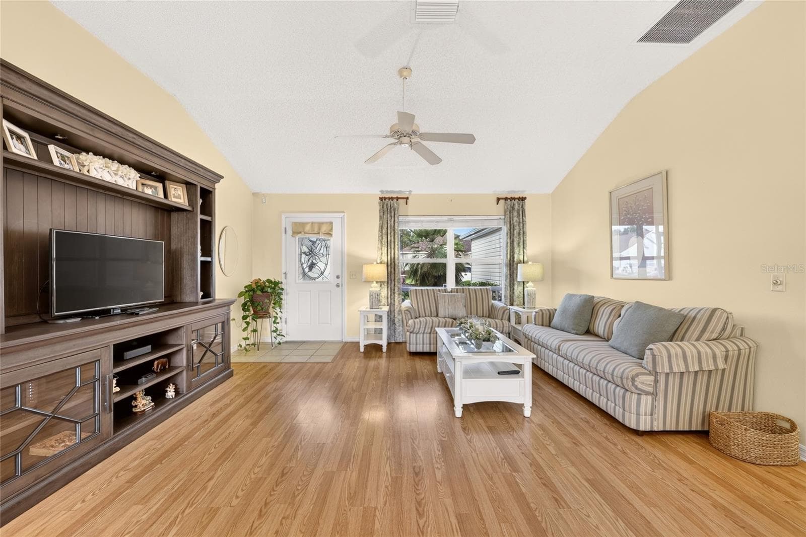 Living Room with Ceiling Fan - 16947 SE 93RD CUTHBERT CIR, THE VILLAGES