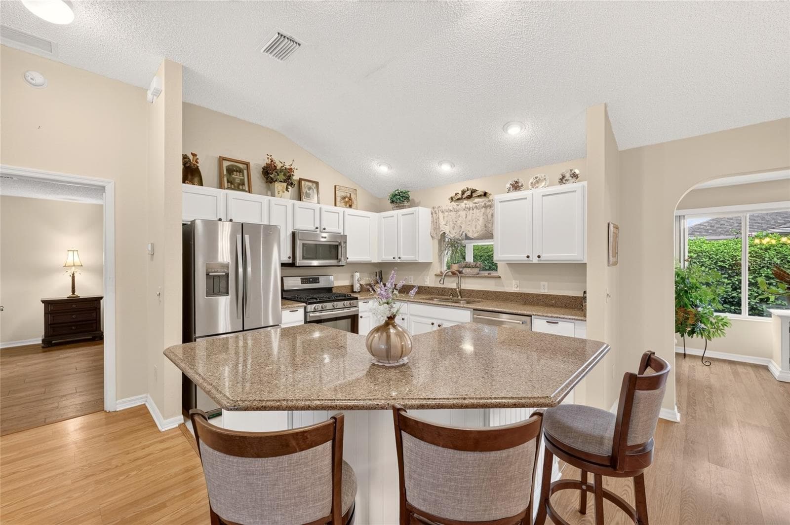 Kitchen with Island - 16947 SE 93RD CUTHBERT CIR, THE VILLAGES