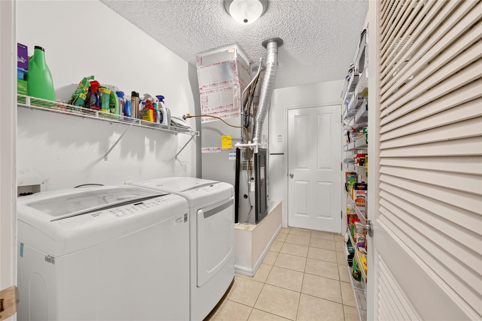 Inside Laundry near Kitchen - 16947 SE 93RD CUTHBERT CIR, THE VILLAGES