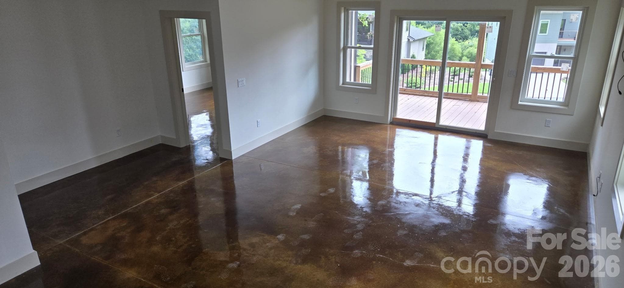 lower level polished concrete floors - 309 Iron Ridge Loop, Asheville