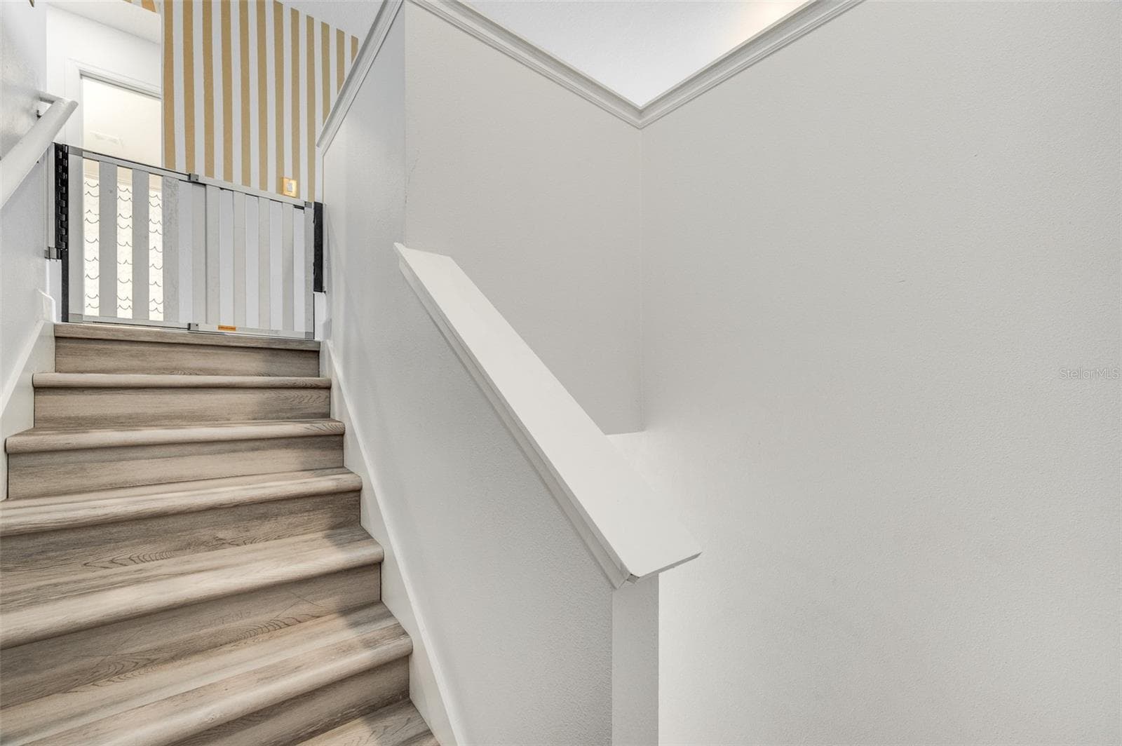 Stairs lead to loft and second floor bedrooms - 2353 CRESCENT MOON ST, KISSIMMEE