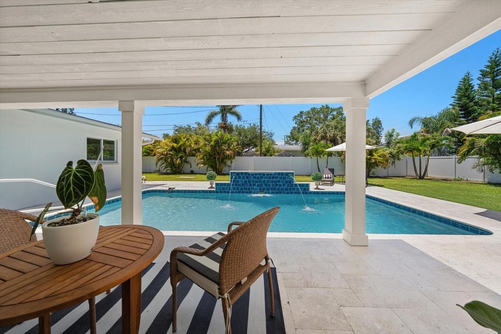 Entertaining or chilling, this covered patio will protect from the elements. - 821 JACARANDA DR, LARGO