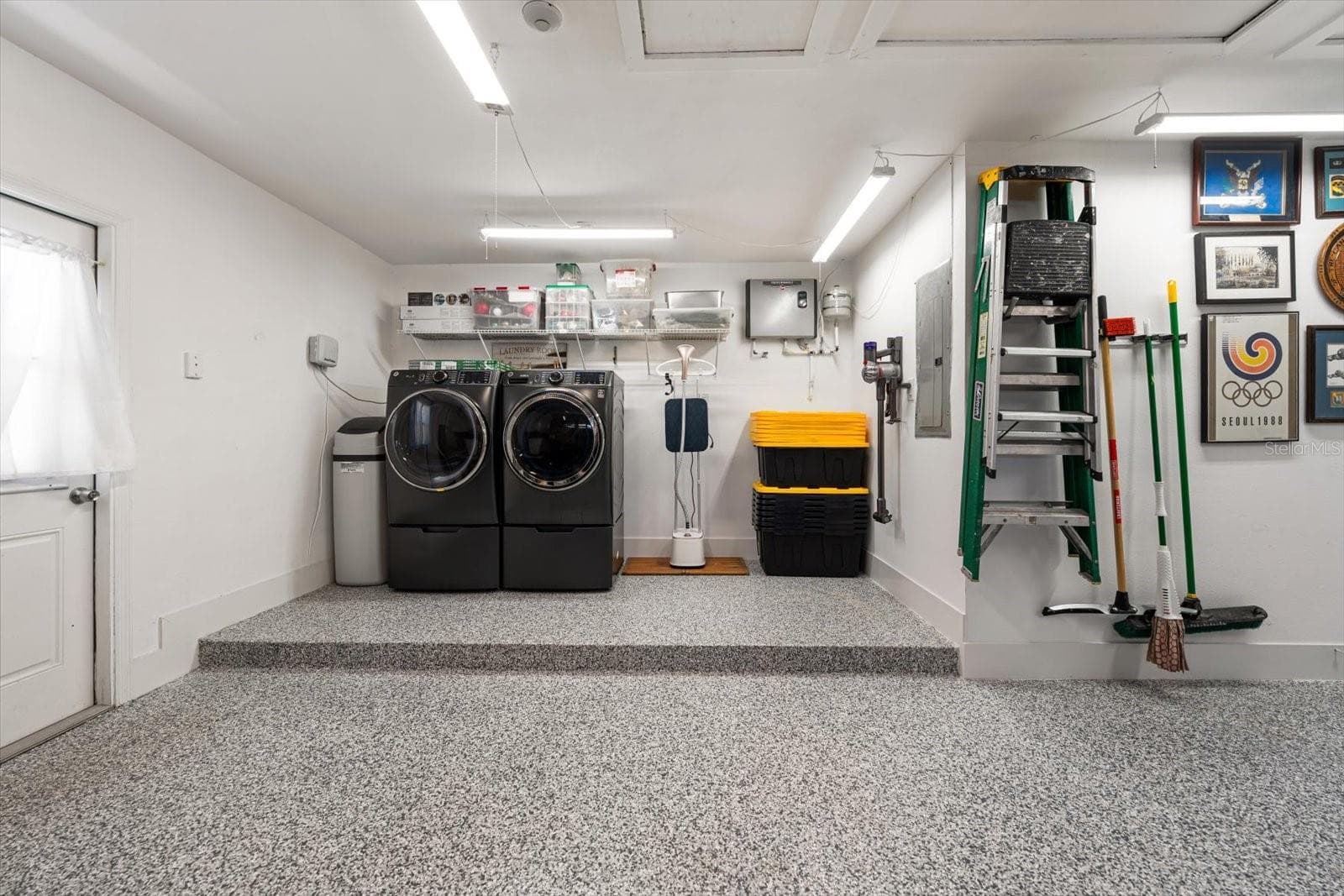 Plenty of space around the laundry with new washer/dryer and on demand water heater means you never run out of hot water! - 821 JACARANDA DR, LARGO