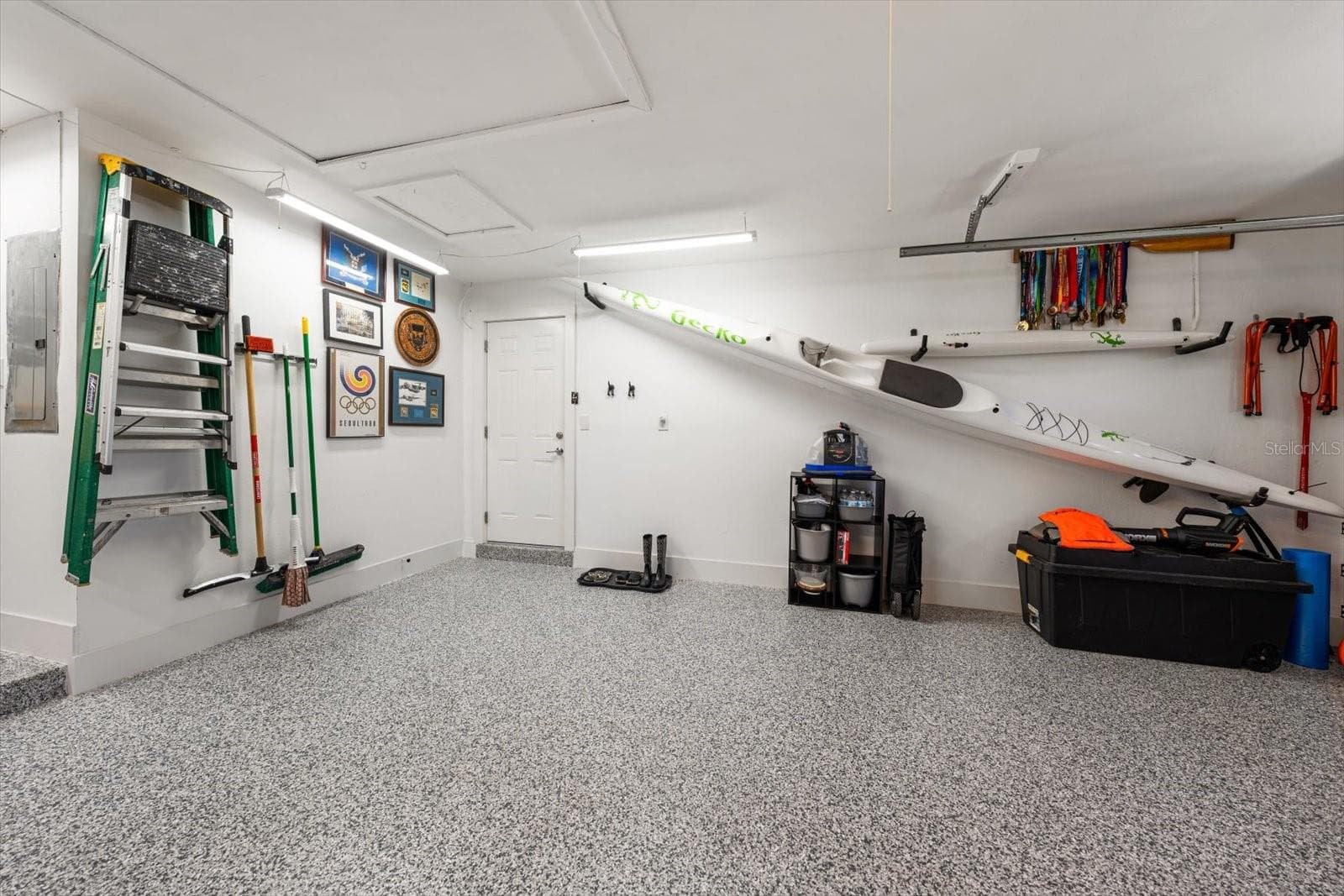 This oversized garage with it's beautiful floor. - 821 JACARANDA DR, LARGO