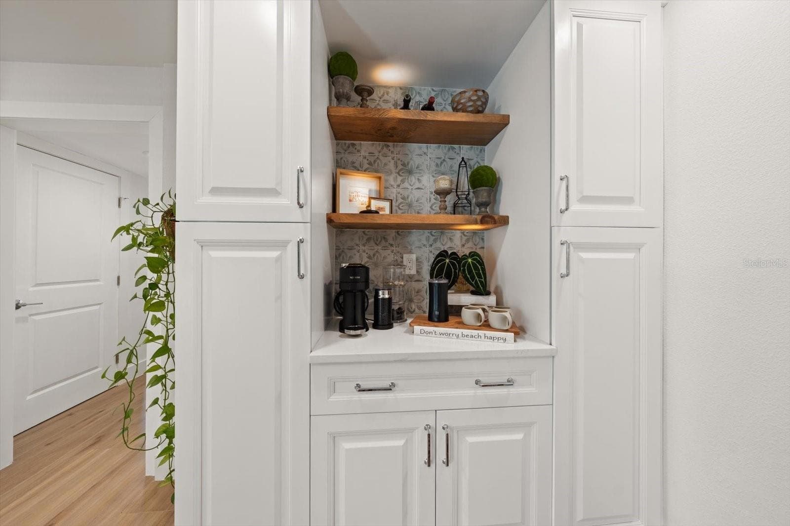 Built in cabinets make a great coffee bar. - 821 JACARANDA DR, LARGO