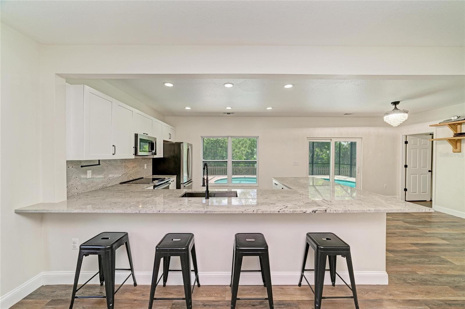 Large peninsula with seating for 8. - 3220 37TH TER E, BRADENTON