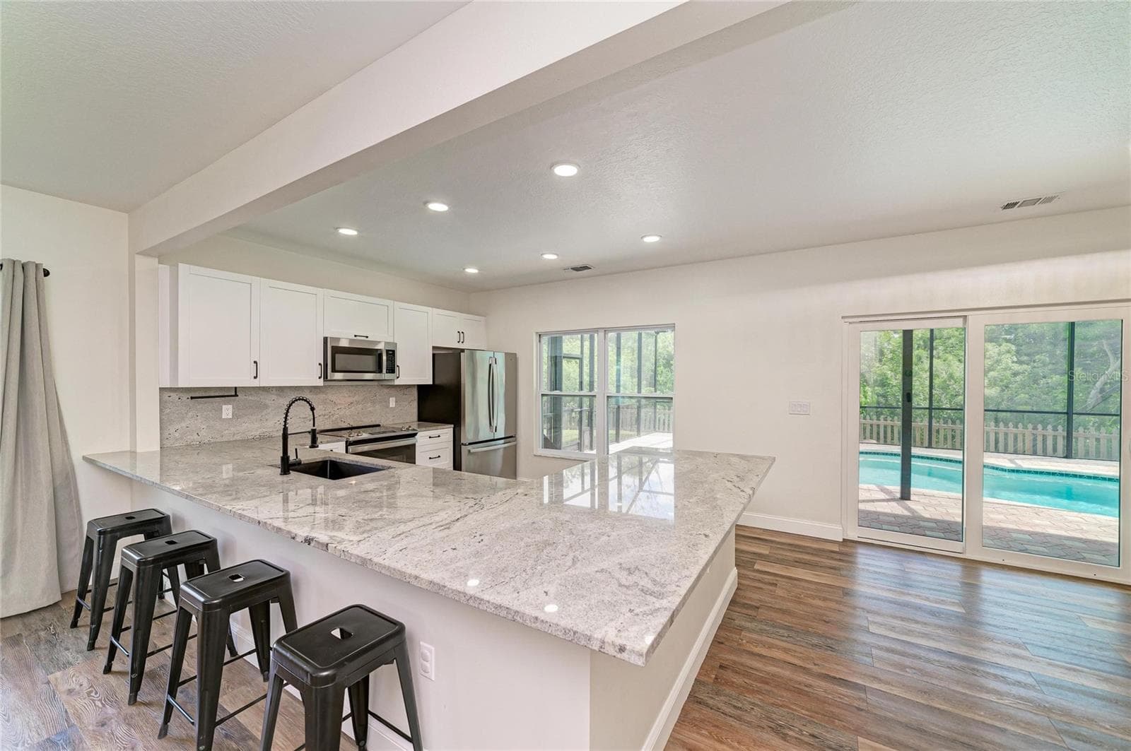 Large peninsula with seating for 8. - 3220 37TH TER E, BRADENTON