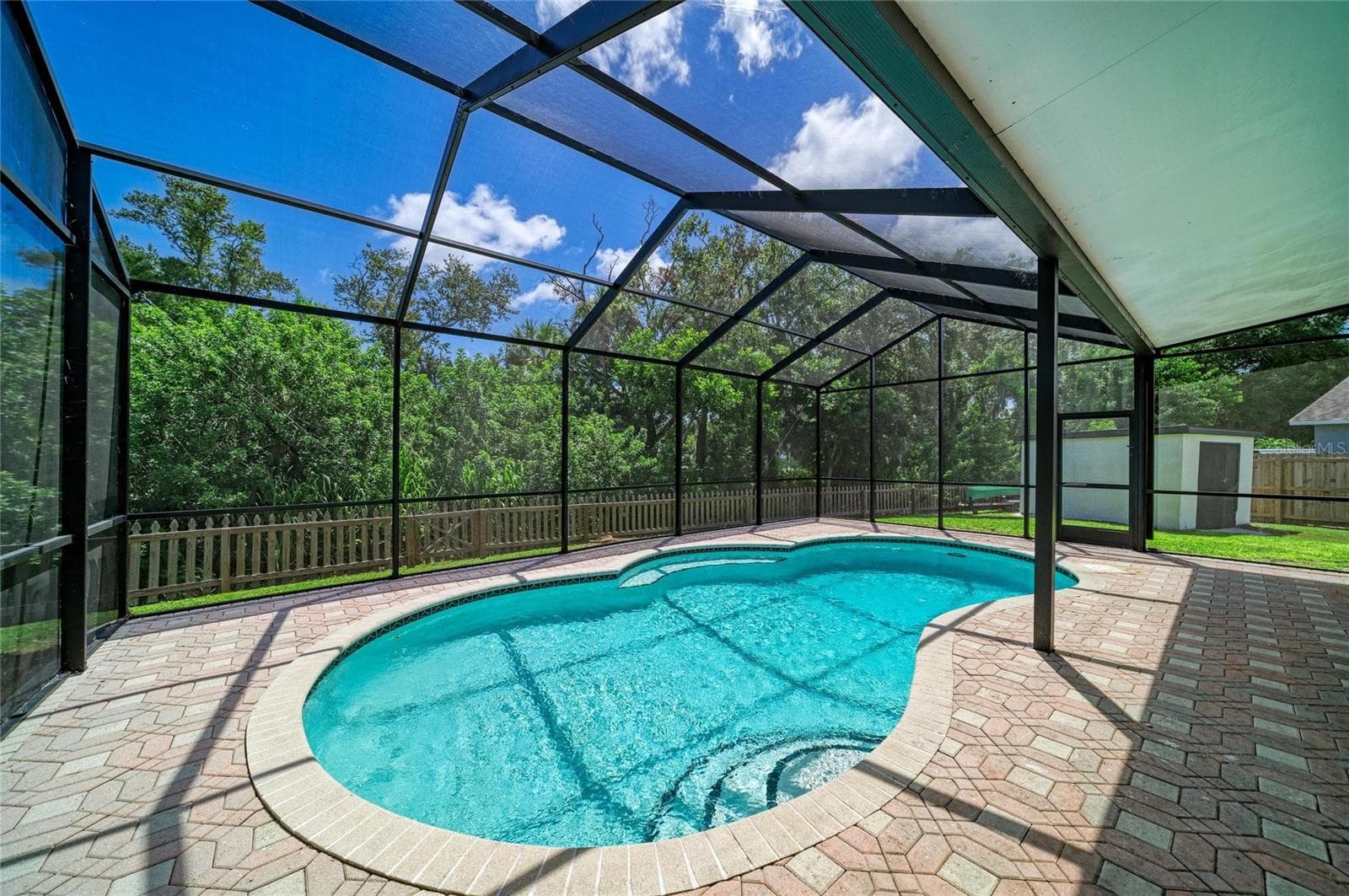 Heated and chilled salt-water pool with newly screened enclosure. - 3220 37TH TER E, BRADENTON