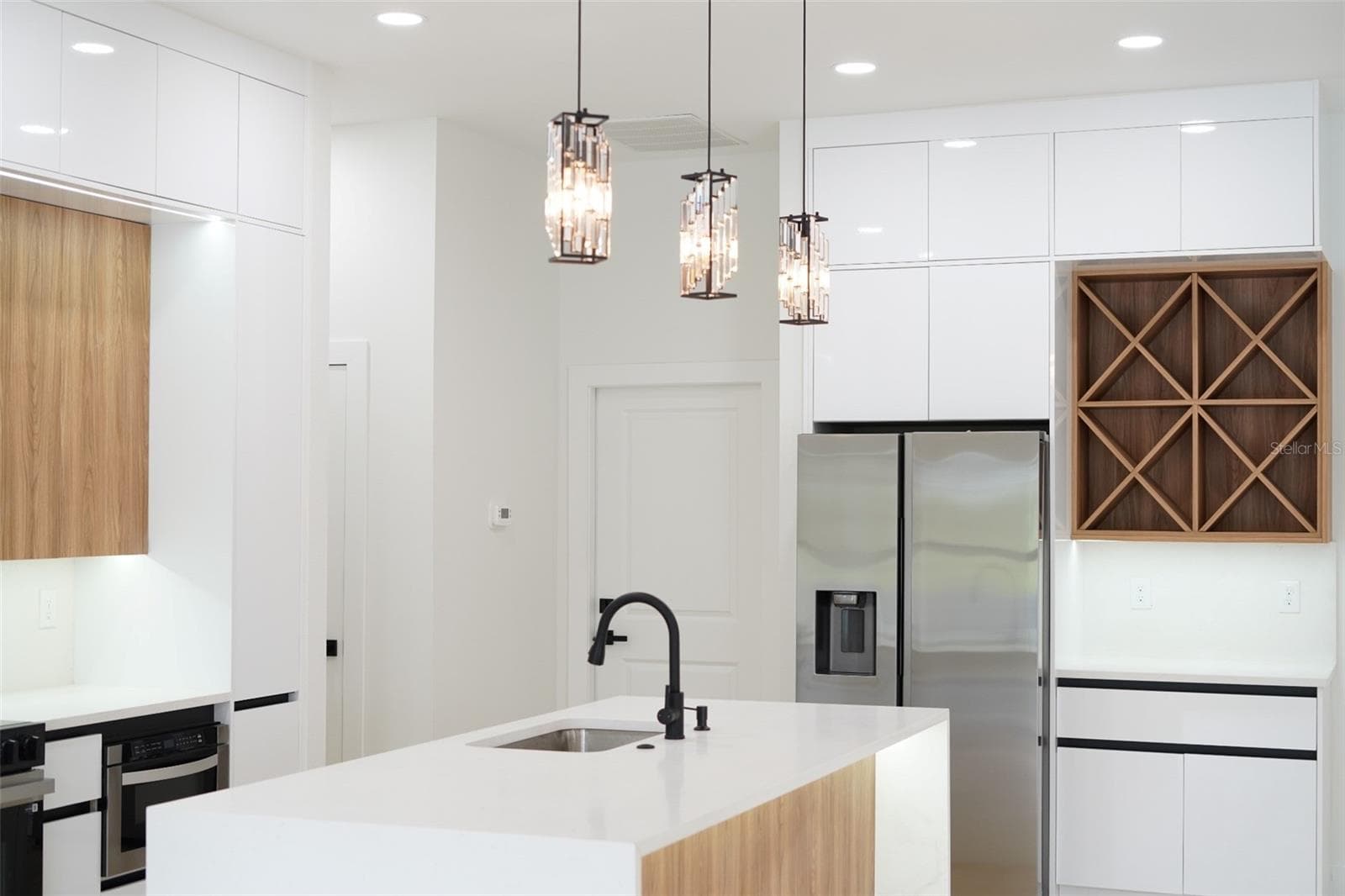 Gourmet Kitchen with Wine Rack built in. - 1310 S WAPELLO ST, NORTH PORT