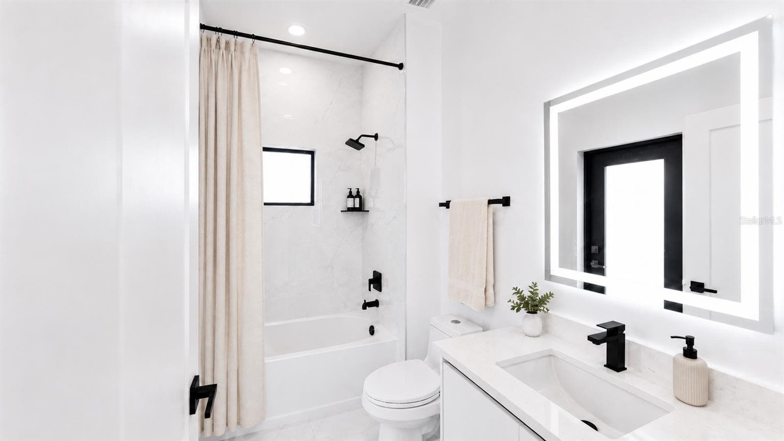 Virtually Stage 2nd Bathroom with Pool Entrance Rendition #1 - 1310 S WAPELLO ST, NORTH PORT