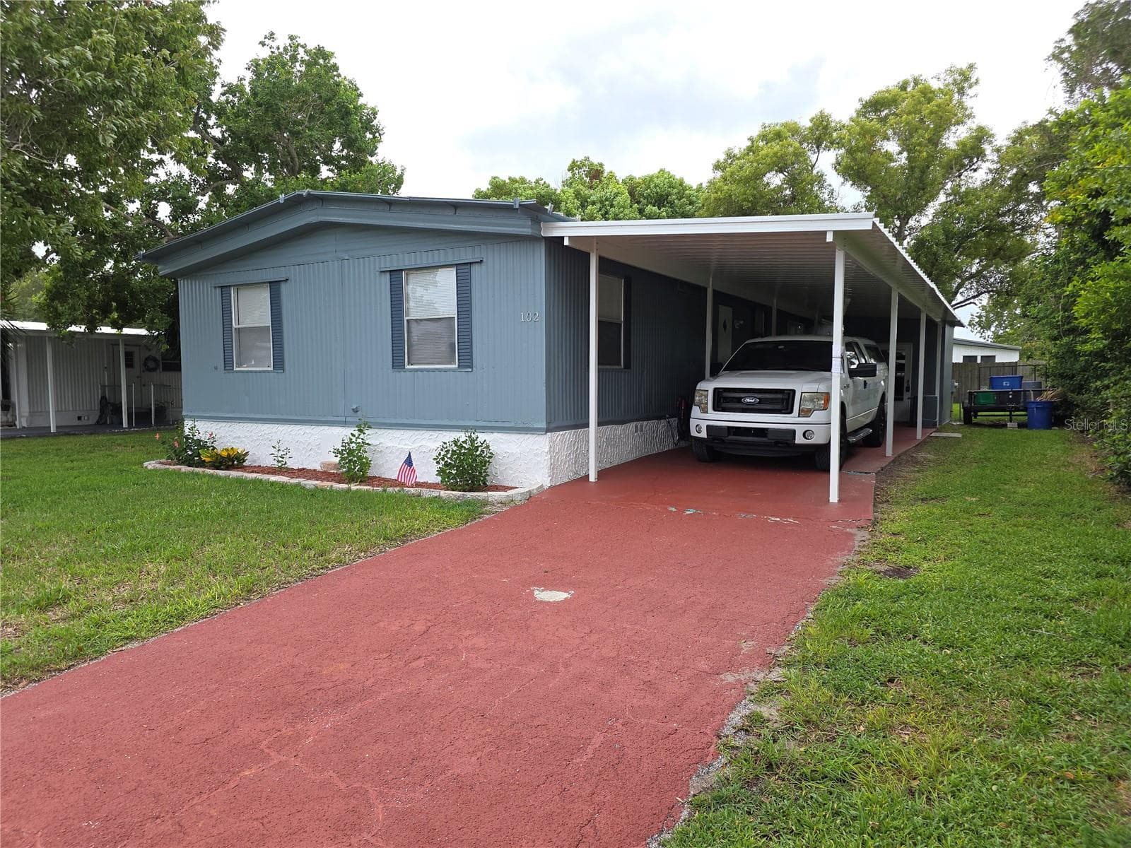 Manufactured Home at 102 BAREFOOT TRL, PORT ORANGE, photo 2 of 20