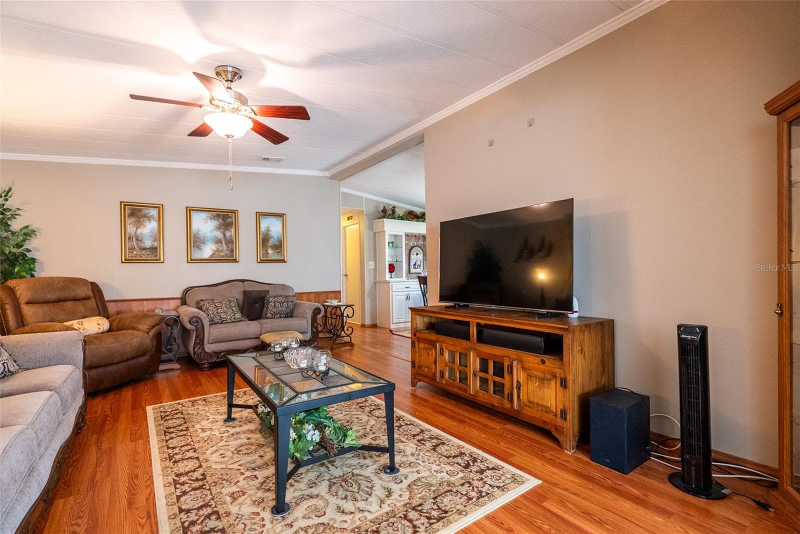 MAIN LIVING ROOM- FURNITURE INCLUDED - 6703 CANTERBURY DR NE, WINTER HAVEN