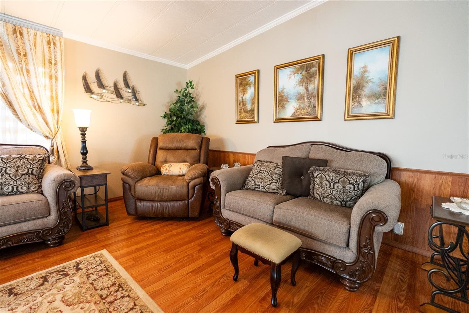 MAIN LIVING ROOM- FURNITURE INCLUDED - 6703 CANTERBURY DR NE, WINTER HAVEN