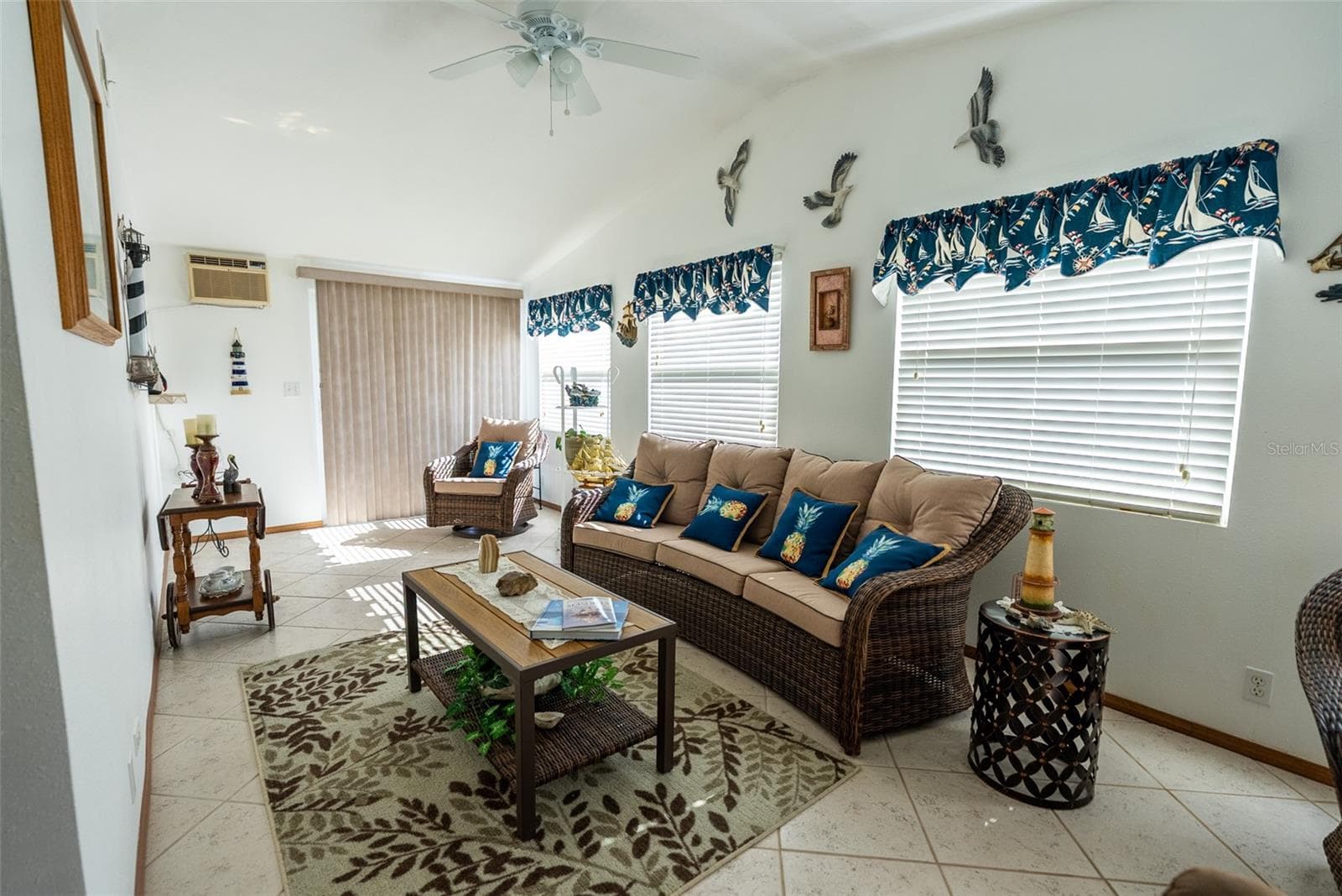 MAIN LIVING ROOM- FURNITURE INCLUDED - 6703 CANTERBURY DR NE, WINTER HAVEN