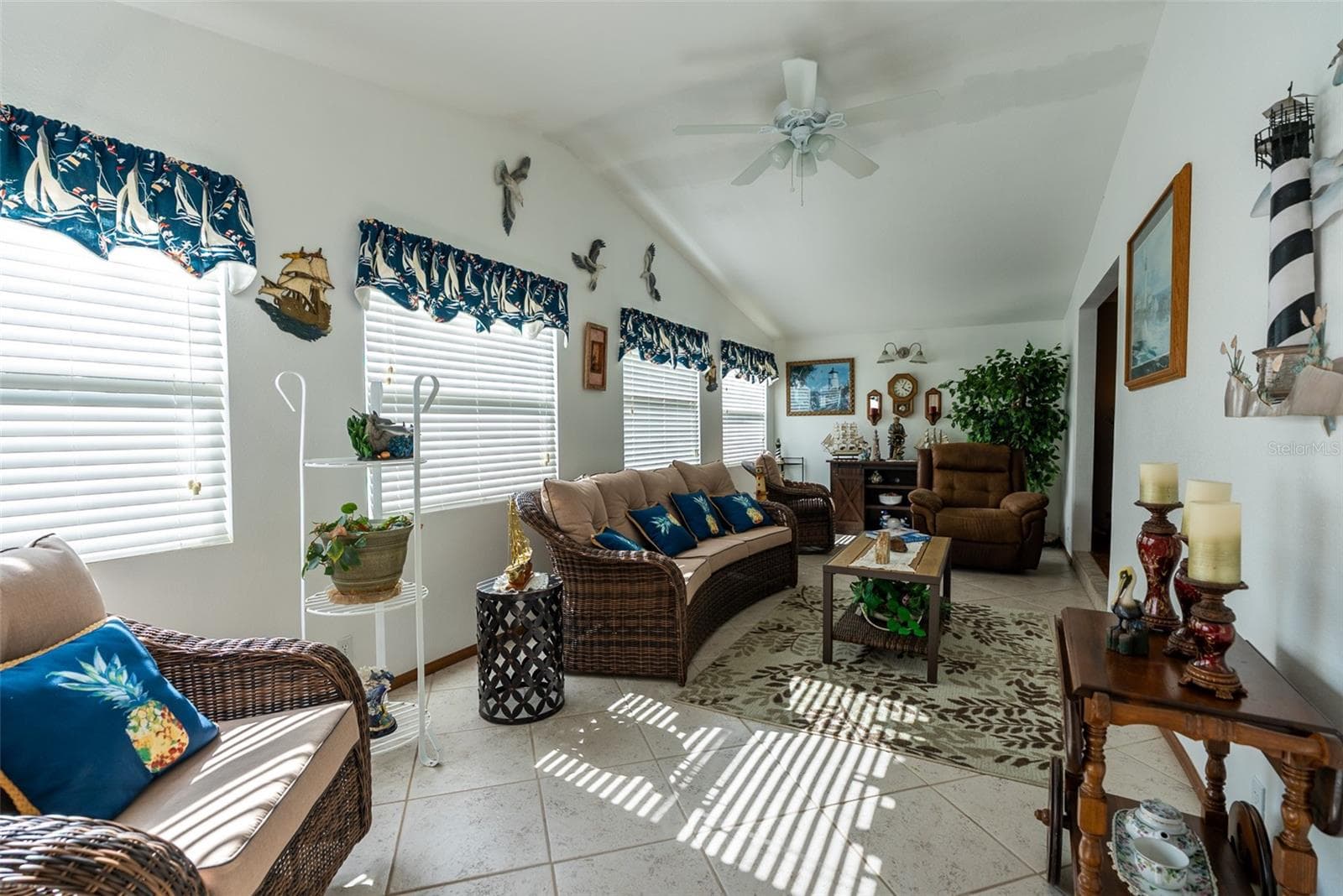 MAIN LIVING ROOM- FURNITURE INCLUDED - 6703 CANTERBURY DR NE, WINTER HAVEN