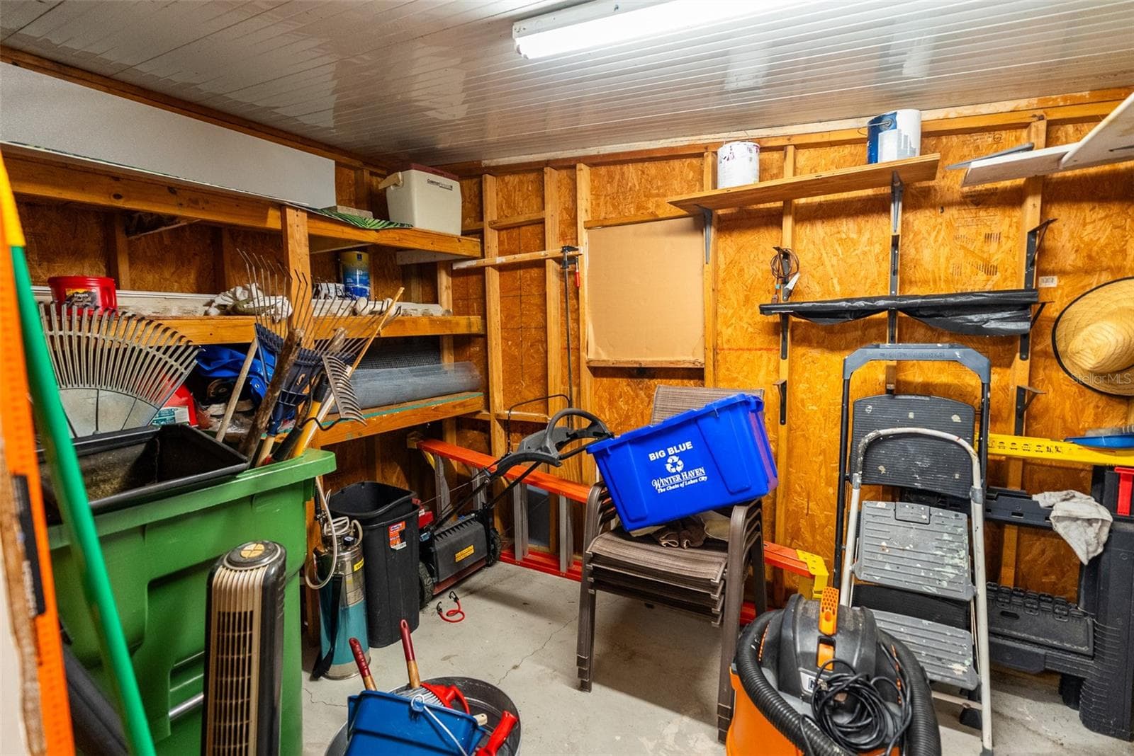 STORAGE ROOM AJACENT TO WORKSHOP - 6703 CANTERBURY DR NE, WINTER HAVEN