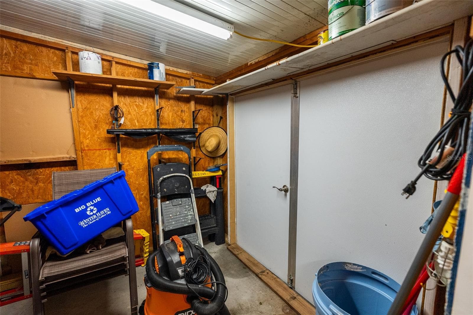 STORAGE ROOM AJACENT TO WORKSHOP - 6703 CANTERBURY DR NE, WINTER HAVEN