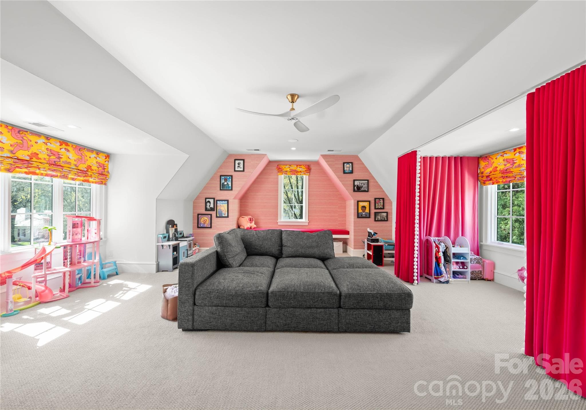 Bonus room with motorized shades, reading bench with custom velvet cushion, and adorable  "theater" curtains. - 2610 Sedley Road, Charlotte