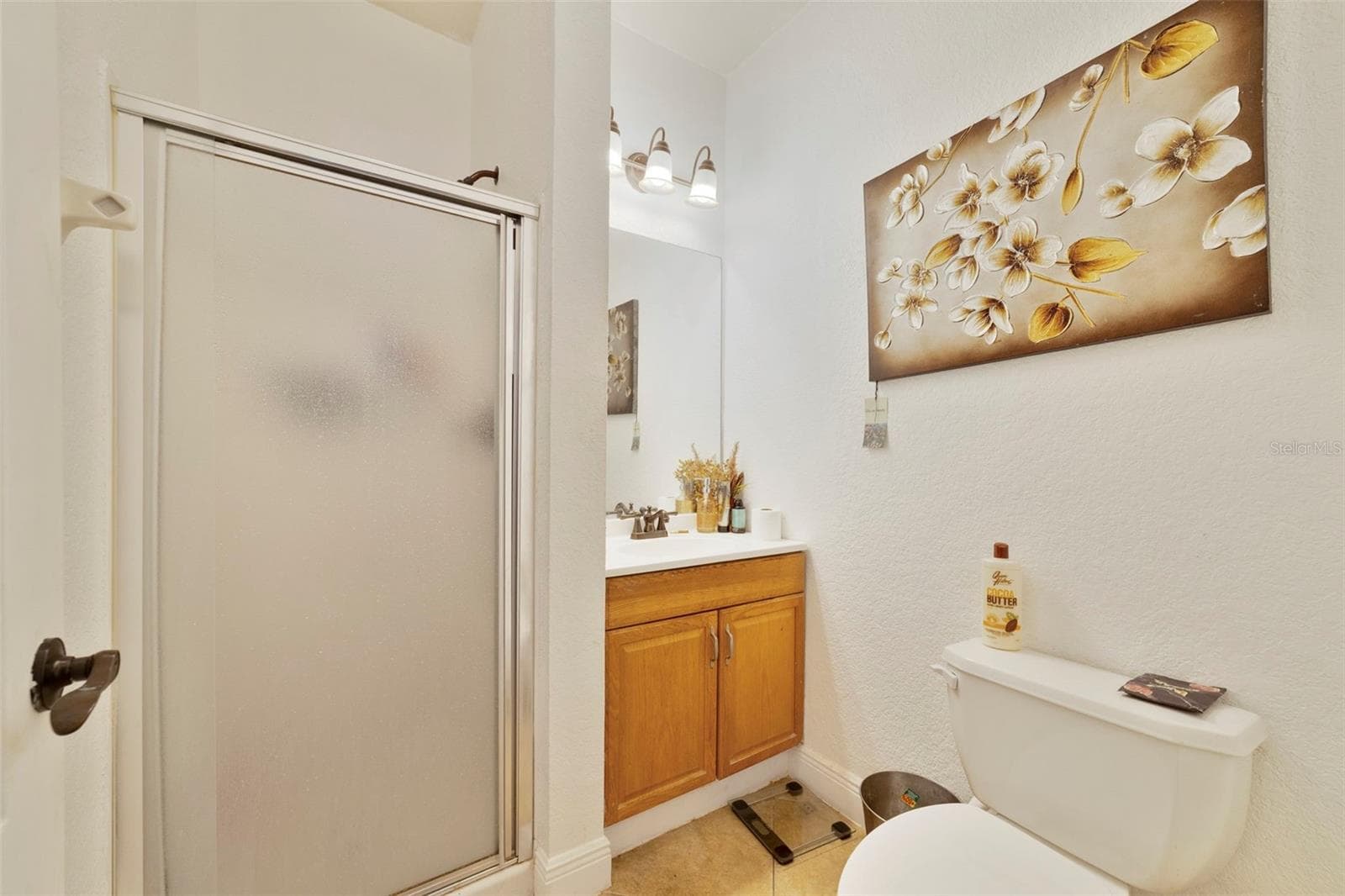 The 3rd bathroom has a walk-in shower and perfect f guests located on the first floor of the condo - 3721 S LAKE ORLANDO PKWY #6, ORLANDO