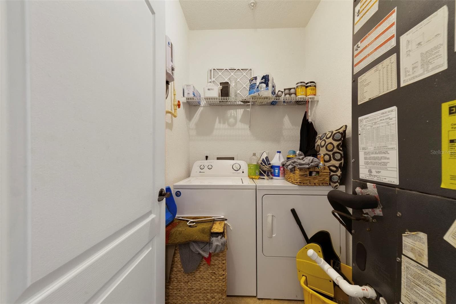 Laundry is a breeze with this walk-in laundry room - 3721 S LAKE ORLANDO PKWY #6, ORLANDO