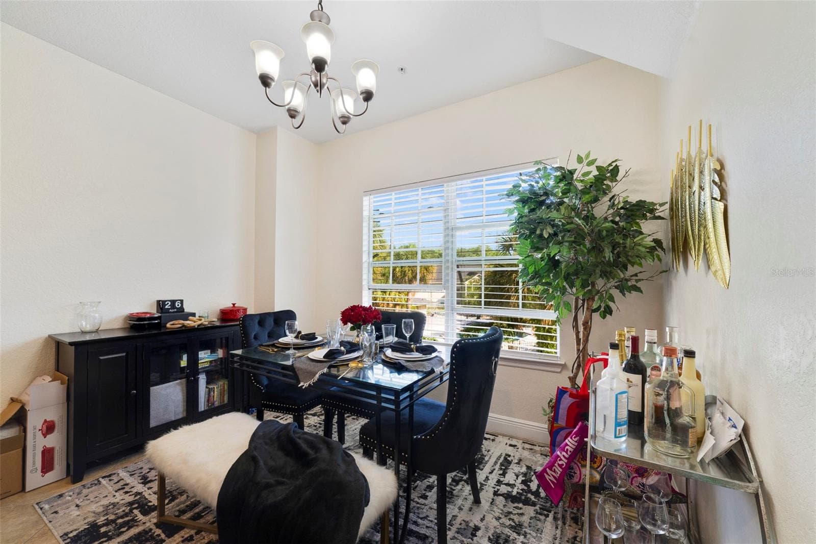The dining room has a nice chandelier - 3721 S LAKE ORLANDO PKWY #8, ORLANDO