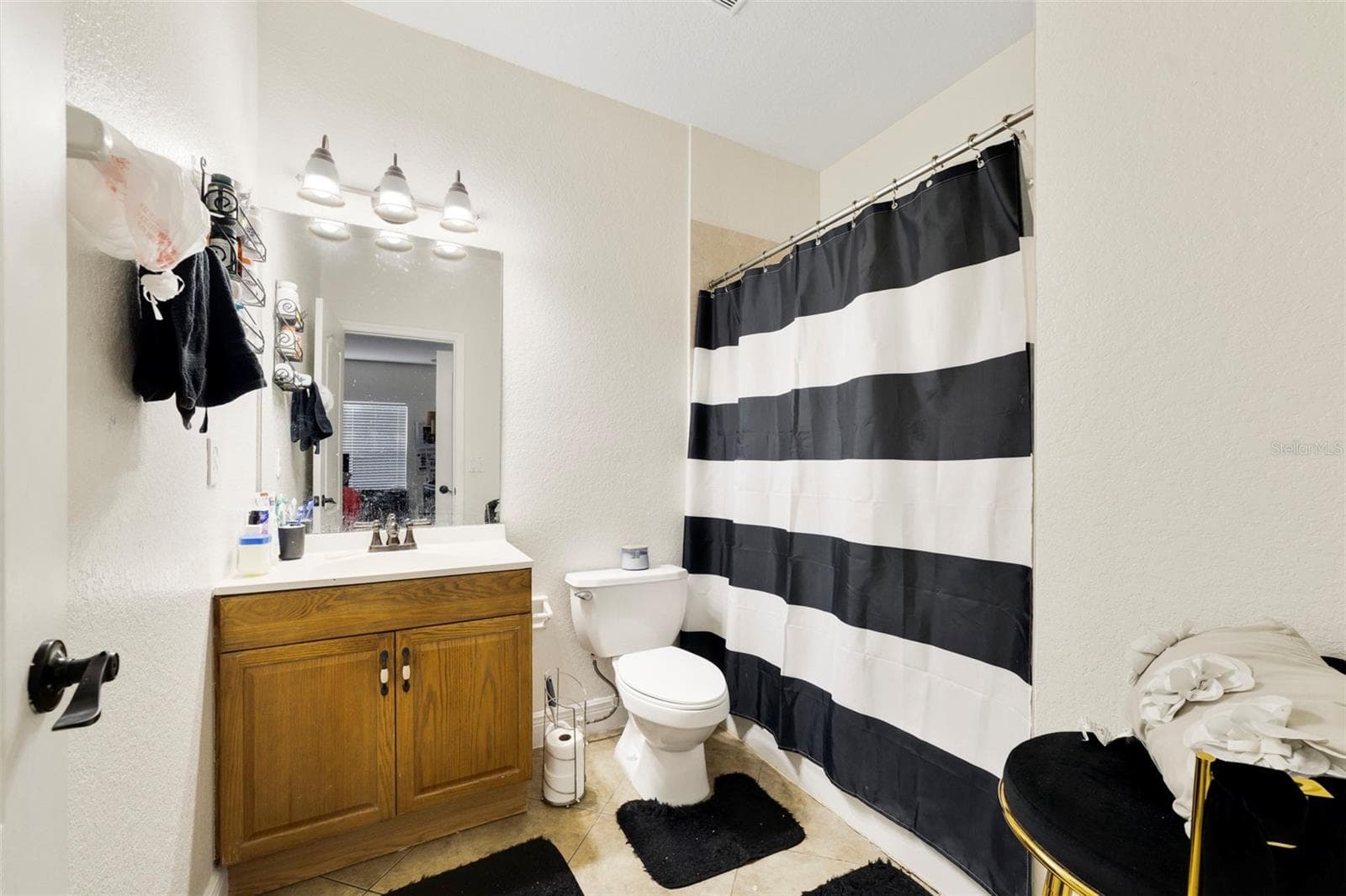 Primary bath with tub/shower combination - 3721 S LAKE ORLANDO PKWY #8, ORLANDO