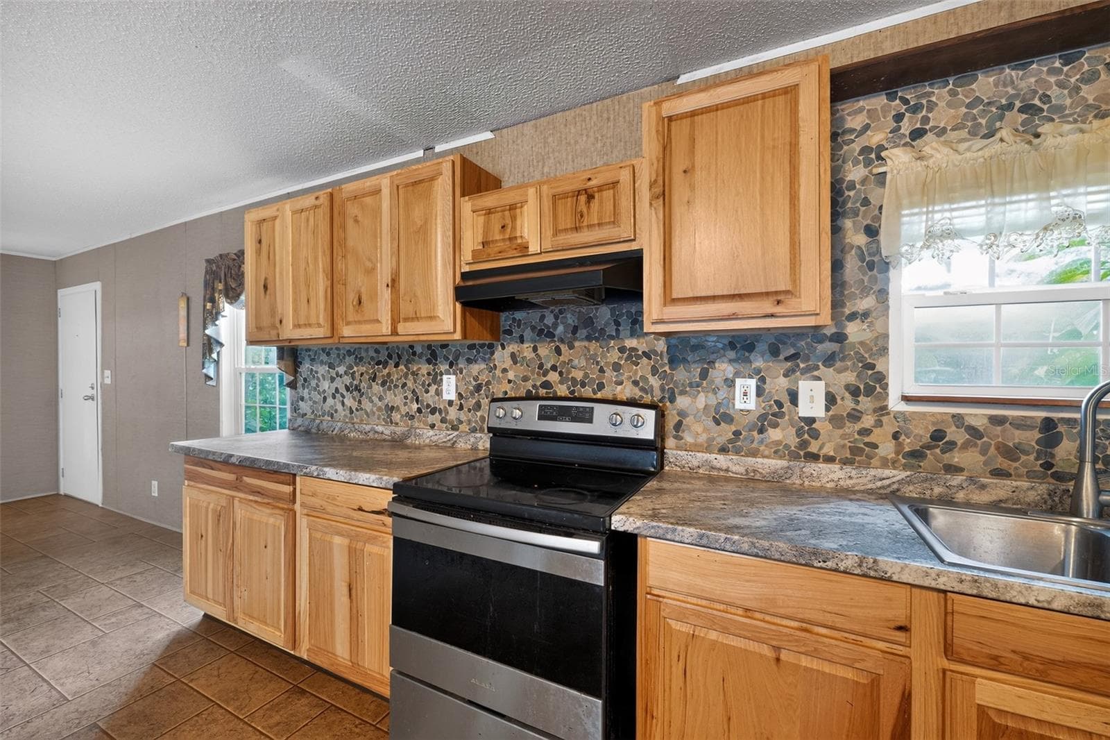 Manufactured Home at 4389 288TH TER, BRANFORD, photo 12 of 29