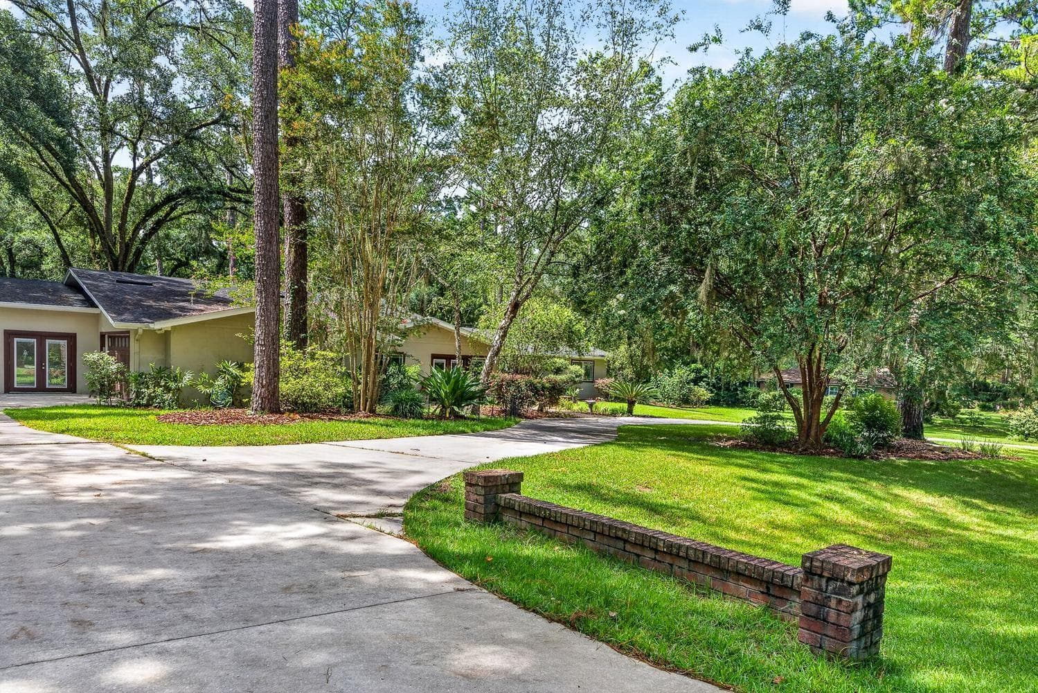 Driveway to Garage and private office on East Side of Home - 11101 NW 12TH PL, GAINESVILLE