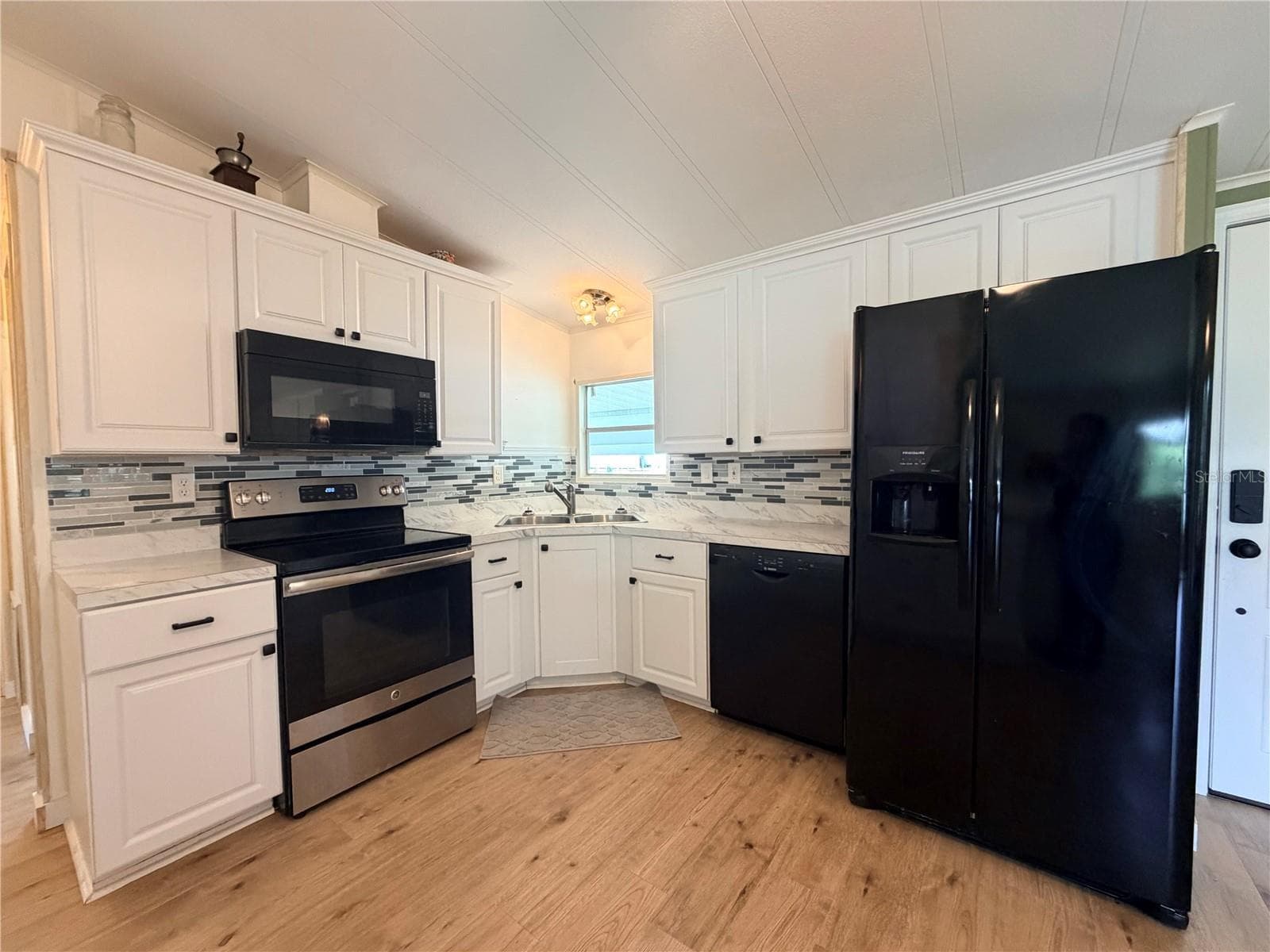 Manufactured Home at 7445 MORIAH AVE, BROOKSVILLE, photo 3 of 28