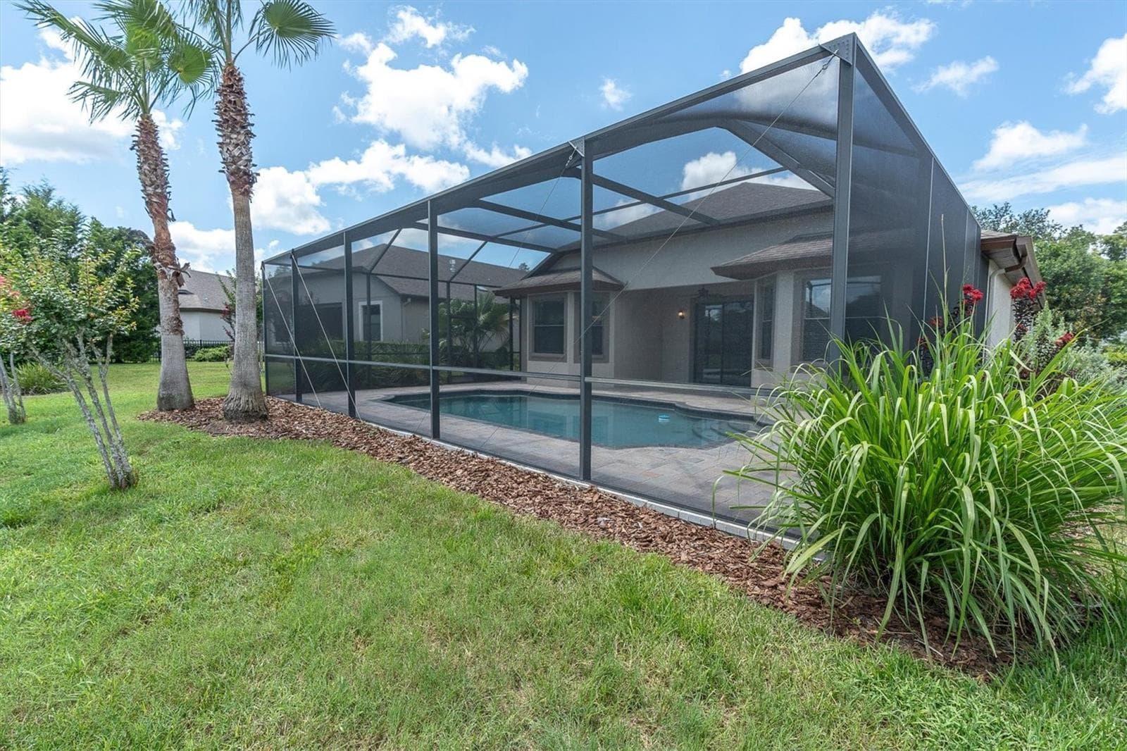 Full Screened Pool enclosure - 8454 MAY PORT CT, LAND O LAKES
