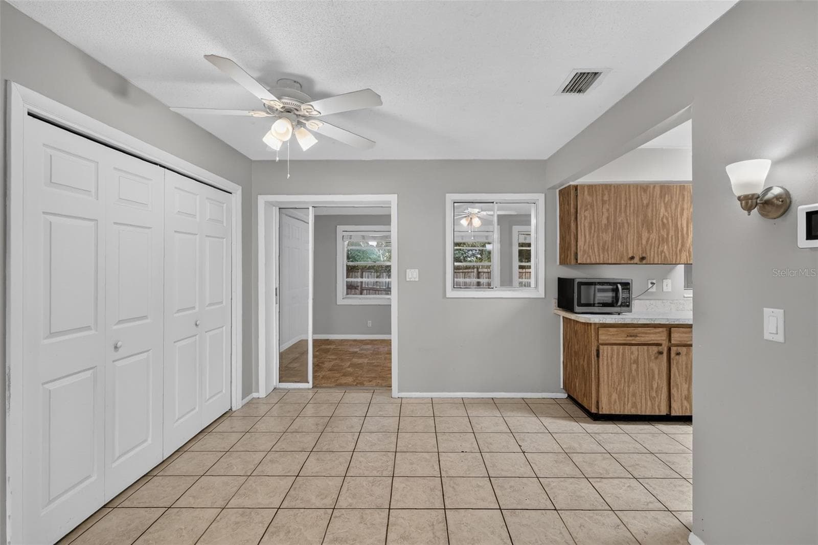 Living and Kitchen Areas Connect Easily for Everyday Living - 1305 ORANGE AVE, TAVARES