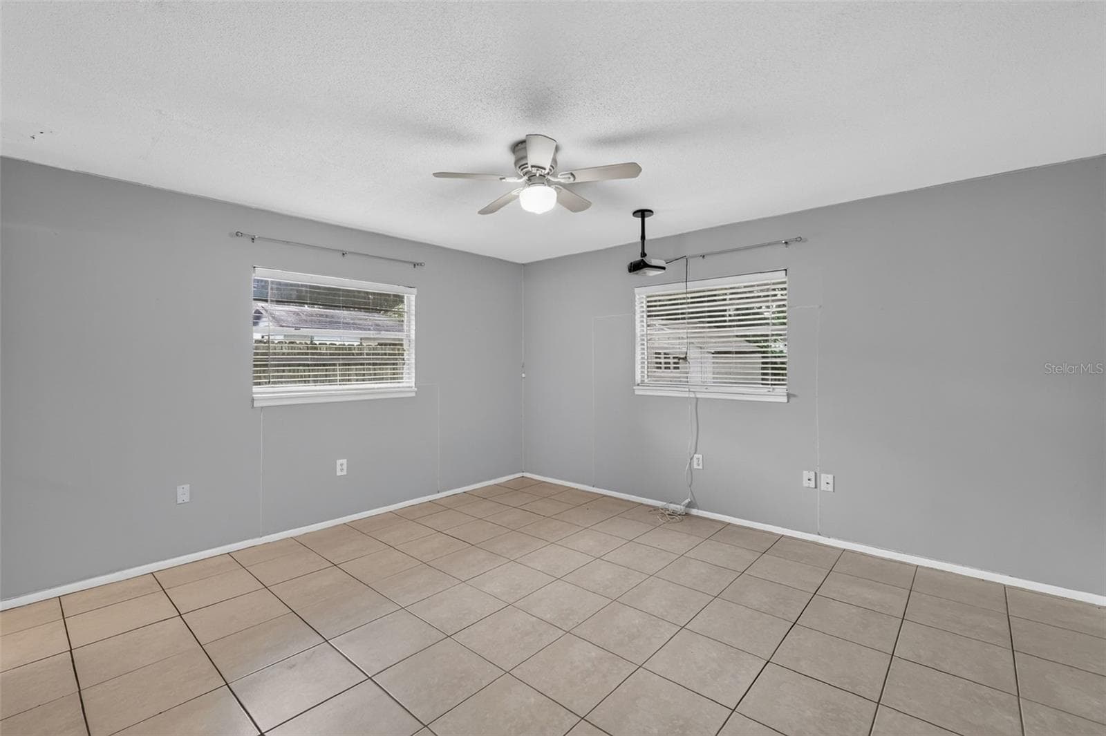 Primary Bedroom with Private Access to the En-Suite Bath - 1305 ORANGE AVE, TAVARES