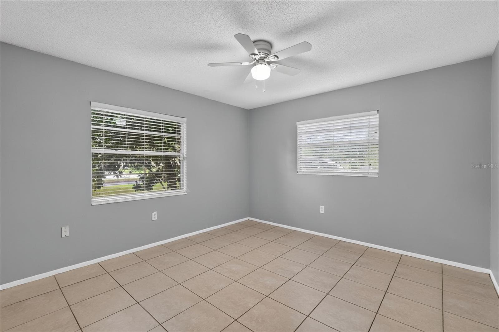 Second Bedroom Offers Good Natural Light and Tile flooring - 1305 ORANGE AVE, TAVARES