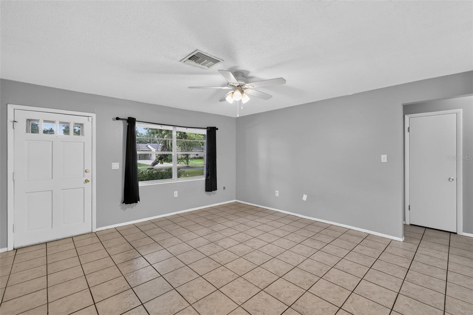 Another View of the Main Living area with Abundant Natural Light - 1305 ORANGE AVE, TAVARES