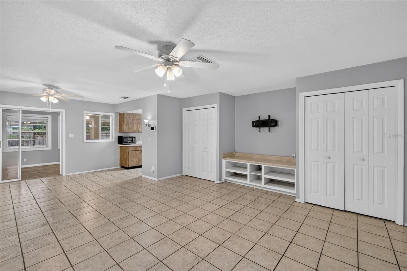 Open Living Space With Easy Flow Into The Kitchen and Florida Room - 1305 ORANGE AVE, TAVARES