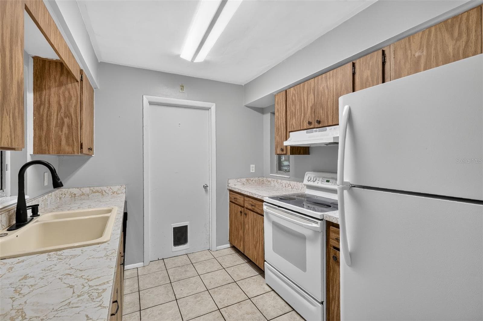 Functional Kitchen Layout with Room To Make It Your Own - 1305 ORANGE AVE, TAVARES
