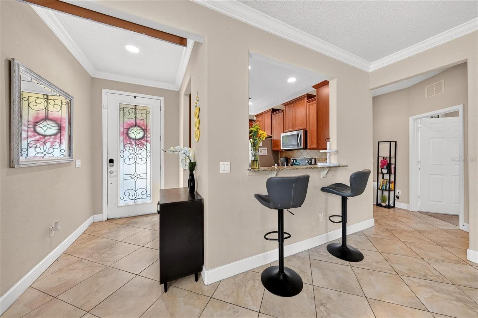 Foyer with Countertop Seats into the Kitchen - 30539 LIPIZZAN TER, MOUNT DORA