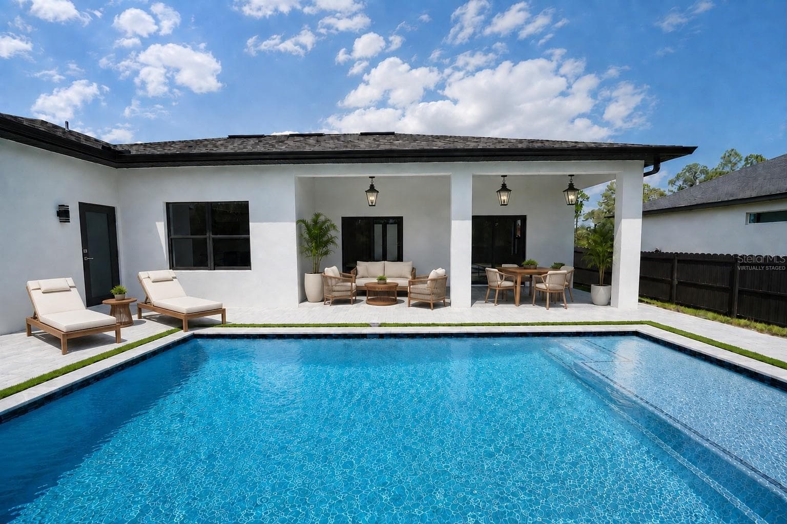 Virtually Staged Pool and Patio Area - 1310 S WAPELLO ST, NORTH PORT
