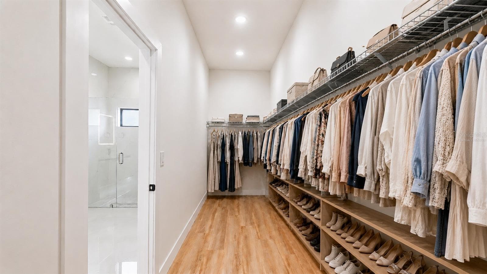 Virtually Staged Primary Walk-In Closet - 1310 S WAPELLO ST, NORTH PORT
