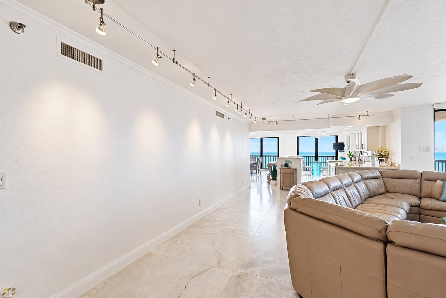 Custom cabinetry and carefully selected furnishings invite everyone to gather. - 1660 GULF BLVD #PH1, CLEARWATER BEACH