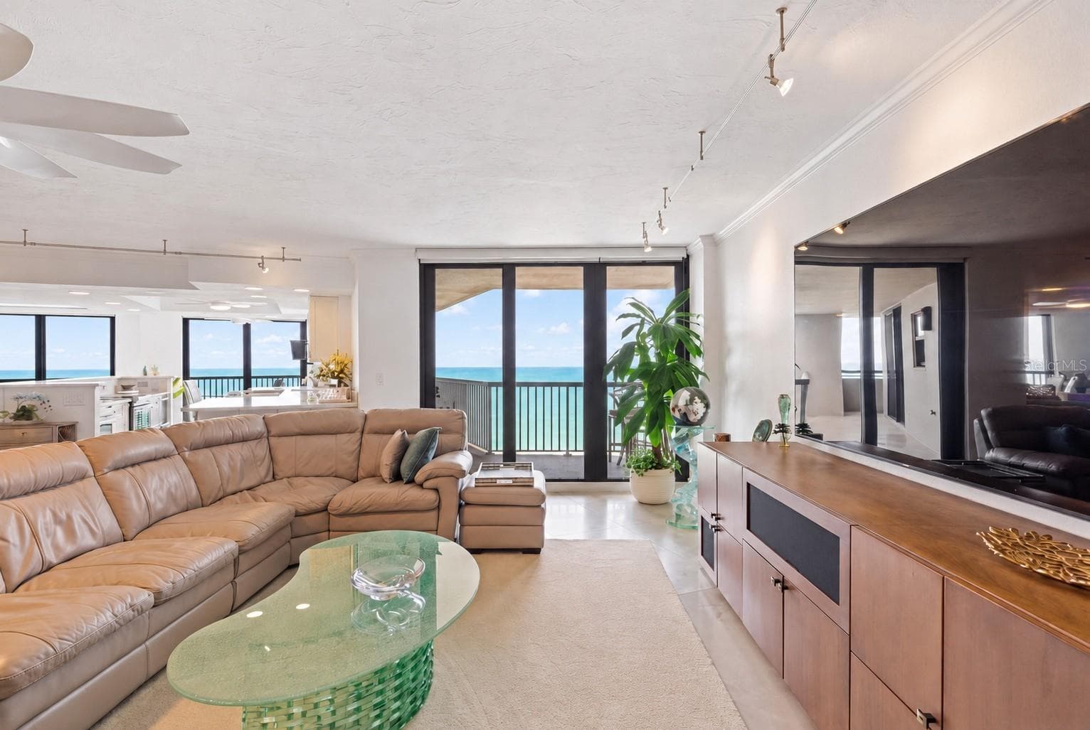 Custom cabinetry and carefully selected furnishings invite everyone to gather. - 1660 GULF BLVD #PH1, CLEARWATER BEACH