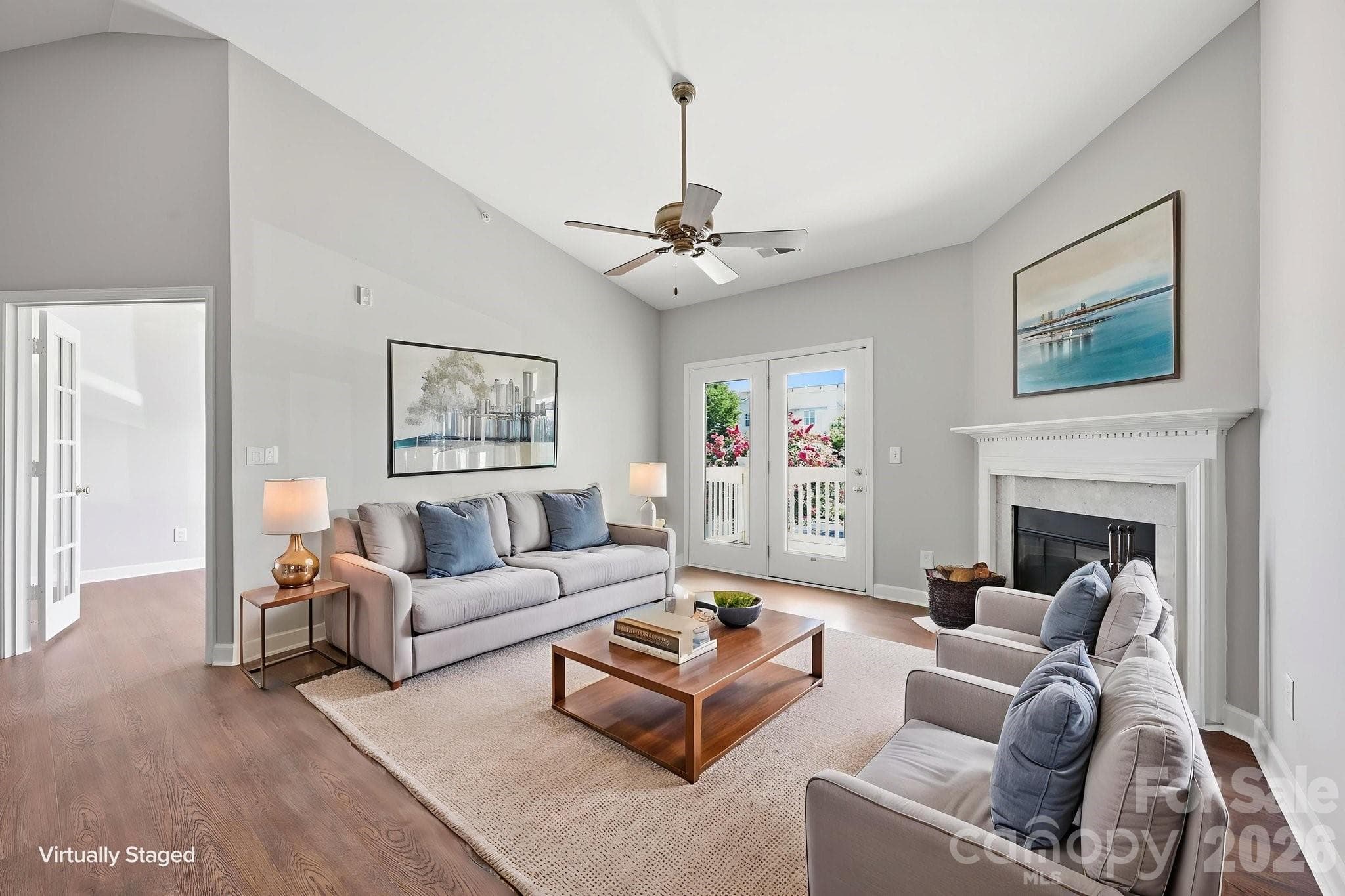 The open and spacious Familly room airy and full of light with vaulted ceiling. Door opens to balcony/patio. - 16648 E Amberside Road, Cornelius