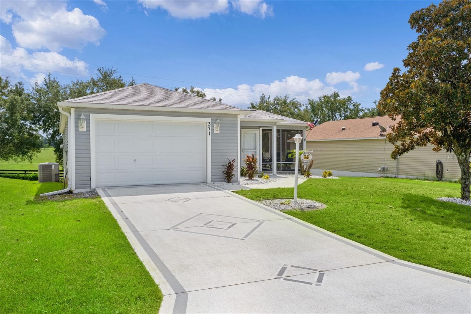 Single Family Residence at 371 ARBELLA LOOP, THE VILLAGES, photo 3 of 34
