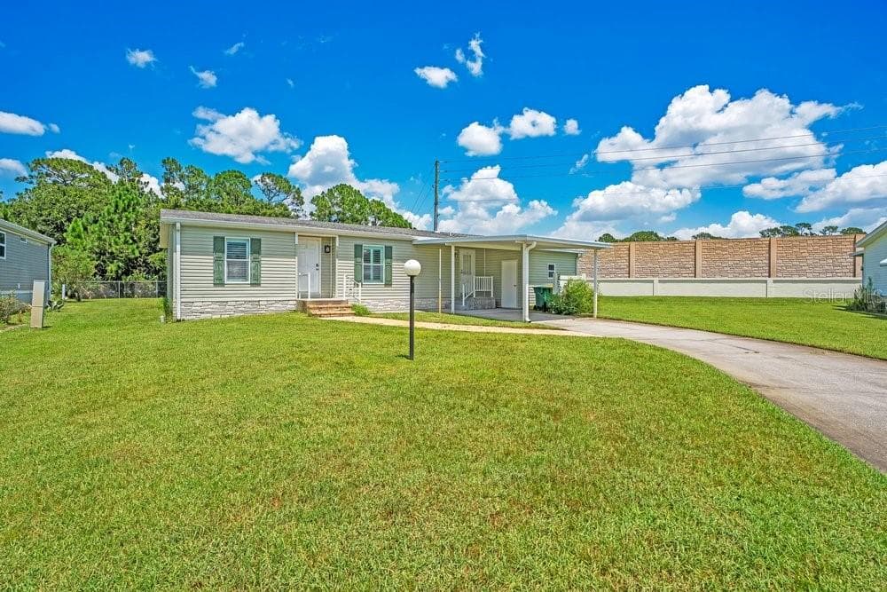 Manufactured Home at 585 OUTER DR, COCOA, photo 2 of 42